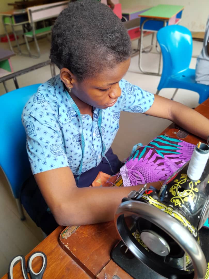 Student at sewing machine — vocational skills